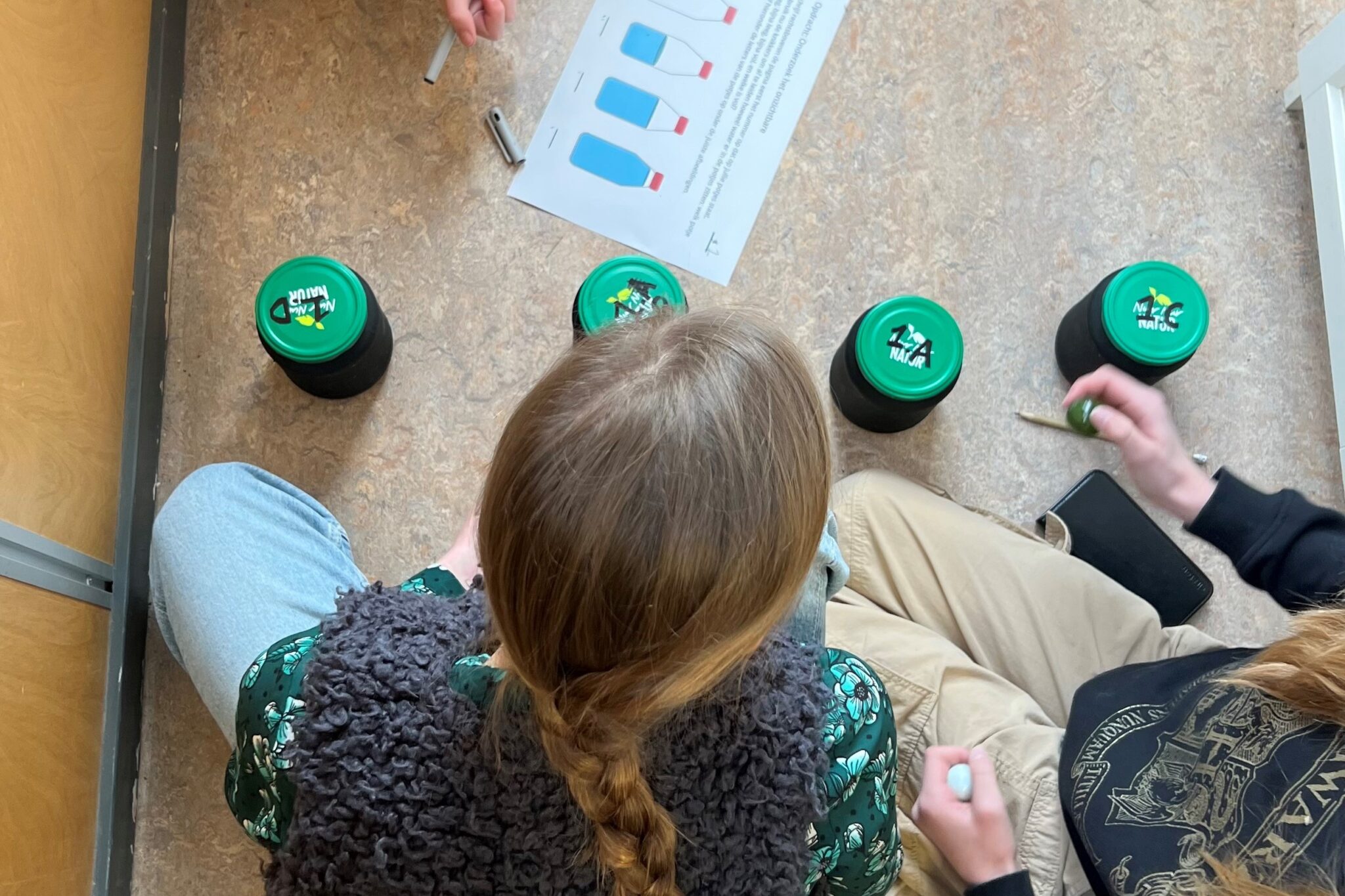 Children experimenting with different black hole models.